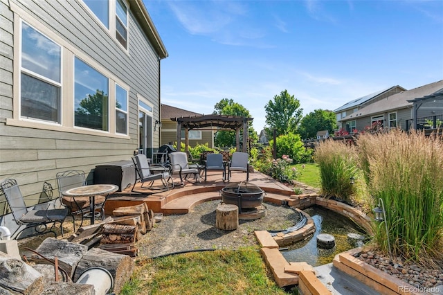 14119 W 89th Loop, Arvada, CO 80005 - view of patio / terrace featuring a fire pit and a pergola