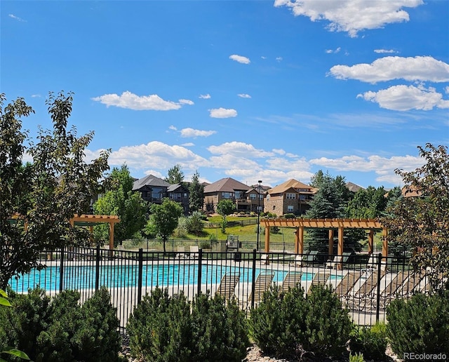 14119 W 89th Loop, Arvada, CO 80005 - community pool featuring a residential view