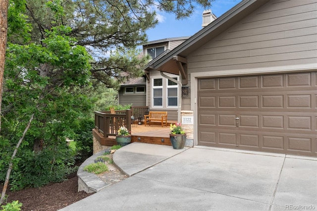 1122 Forest Trails Dr, Castle Pines, CO 80108 - view of property exterior featuring driveway, a wooden deck, a chimney, and a garage