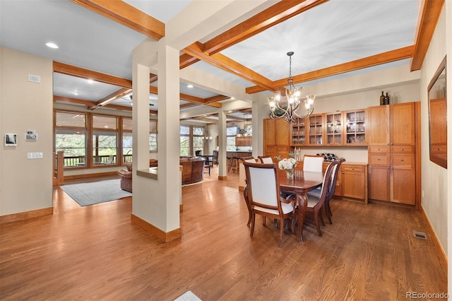 1122 Forest Trails Dr, Castle Pines, CO 80108 - dining space with dark wood-style flooring, beamed ceiling, a chandelier, coffered ceiling, and recessed lighting