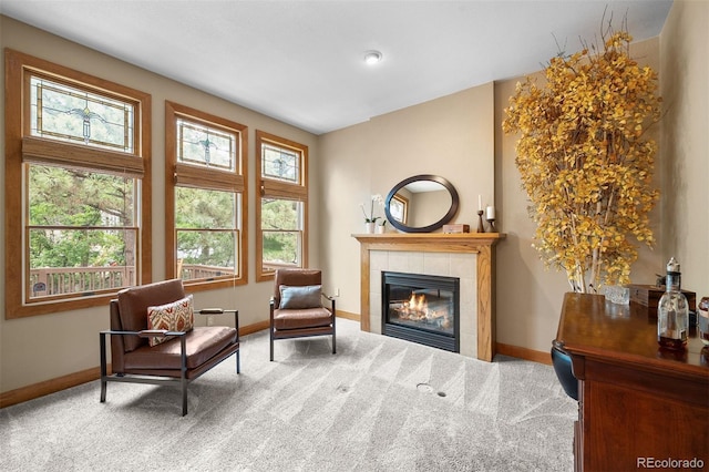 1122 Forest Trails Dr, Castle Pines, CO 80108 - sitting room featuring plenty of natural light, a tiled fireplace, and carpet