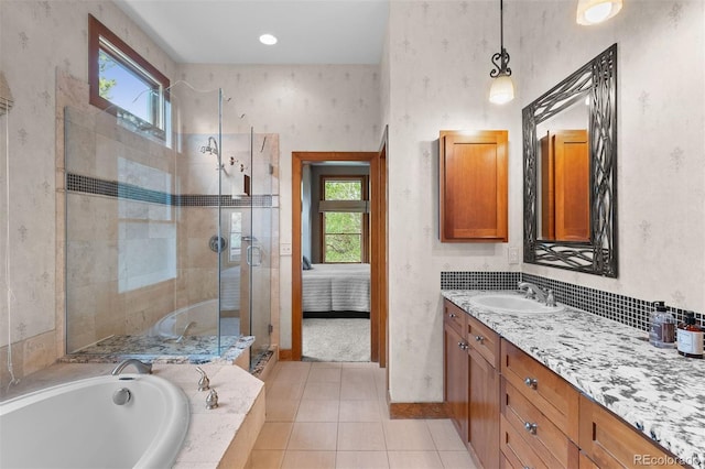 1122 Forest Trails Dr, Castle Pines, CO 80108 - bathroom featuring healthy amount of natural light, a shower stall, vanity, and a bath