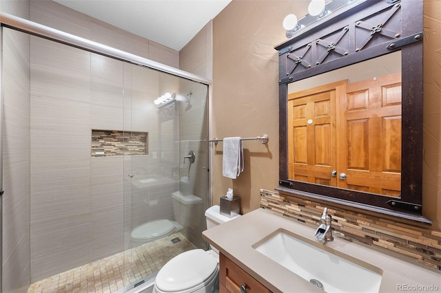 1122 Forest Trails Dr, Castle Pines, CO 80108 - bathroom featuring vanity, a stall shower, and backsplash