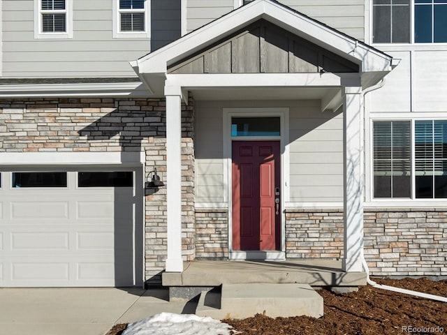 property entrance with a garage