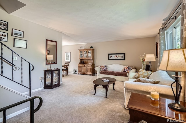 6857 S Franklin Cir, Centennial, CO 80122 - living room with carpet, stairway, and baseboards