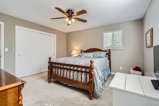 6857 S Franklin Cir, Centennial, CO 80122 - bedroom with light colored carpet, a closet, and a ceiling fan