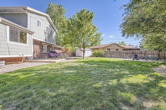 6857 S Franklin Cir, Centennial, CO 80122 - view of yard with a patio and a fire pit