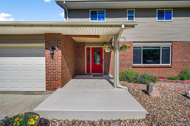 7486 S Washington St, Centennial, CO 80122 - doorway to property with brick siding and a garage
