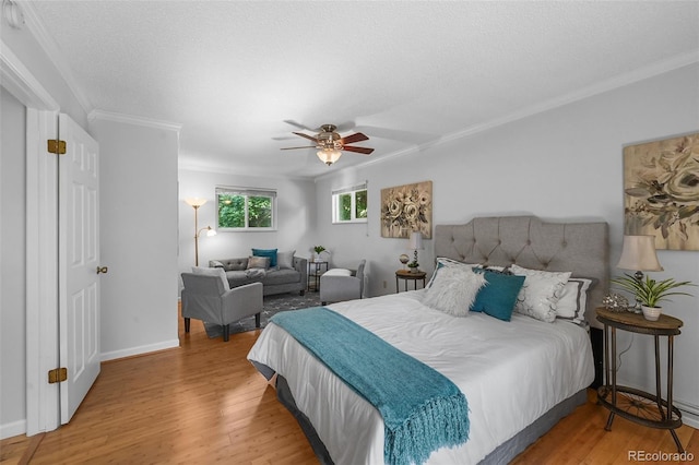 7486 S Washington St, Centennial, CO 80122 - bedroom featuring wood finished floors, ornamental molding, and a ceiling fan