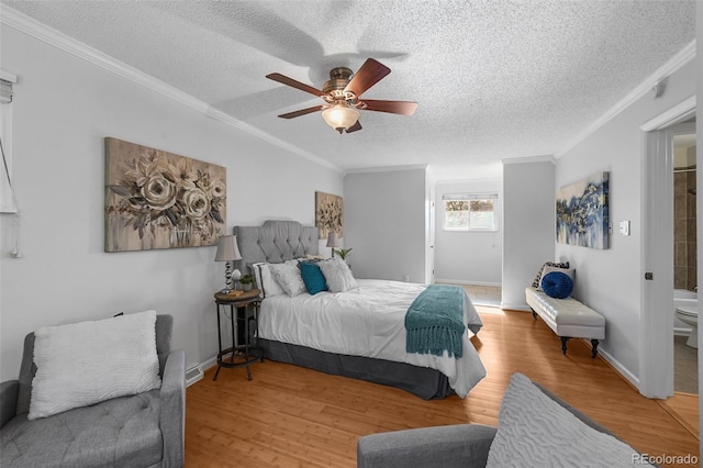 7486 S Washington St, Centennial, CO 80122 - bedroom featuring crown molding, a textured ceiling, wood finished floors, and a ceiling fan