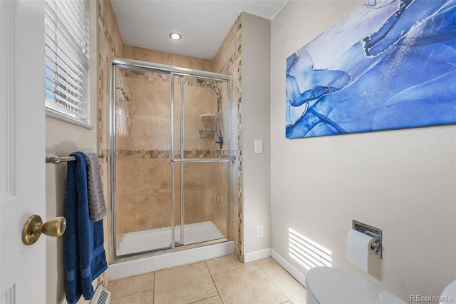 7486 S Washington St, Centennial, CO 80122 - bathroom with tile patterned floors and a stall shower