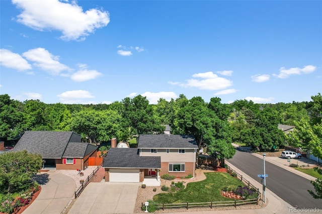7486 S Washington St, Centennial, CO 80122 - aerial view of property and surrounding area featuring a heavily wooded area