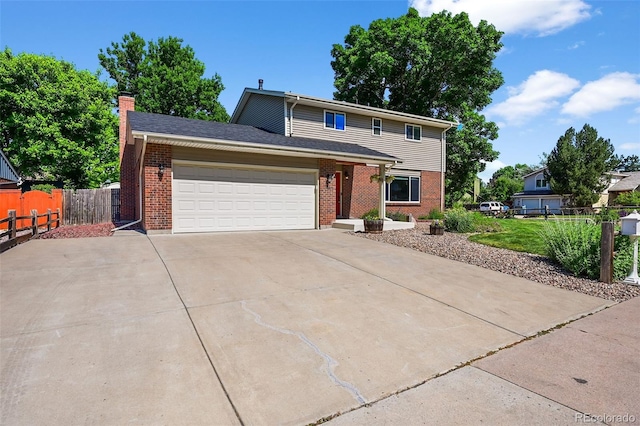7486 S Washington St, Centennial, CO 80122 - traditional home with concrete driveway, brick siding, an attached garage, and a chimney