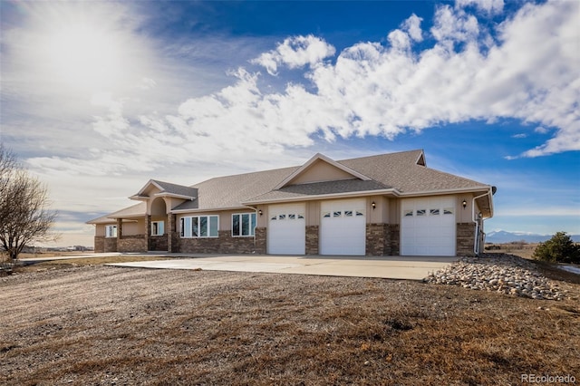 view of front of home with a garage