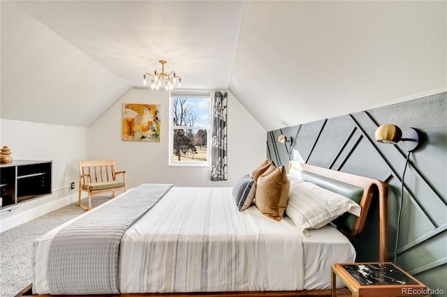 carpeted bedroom featuring an inviting chandelier, baseboards, and vaulted ceiling