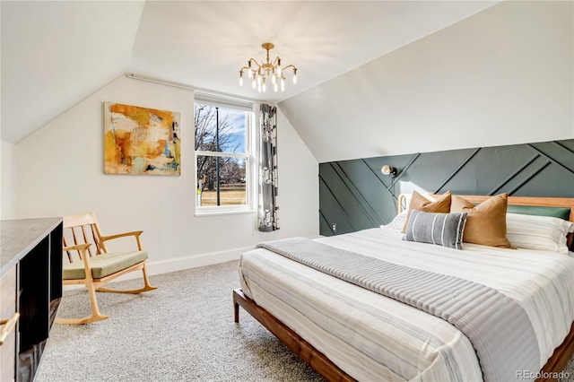 carpeted bedroom with lofted ceiling, baseboards, and a chandelier