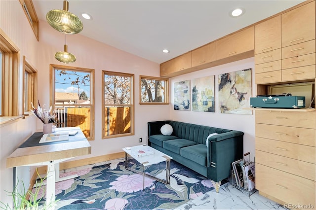 sitting room with vaulted ceiling and recessed lighting