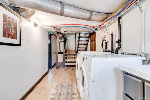 utility room featuring separate washer and dryer