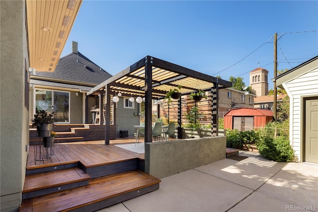 exterior space featuring a storage shed, an outbuilding, central air condition unit, a patio area, and a pergola