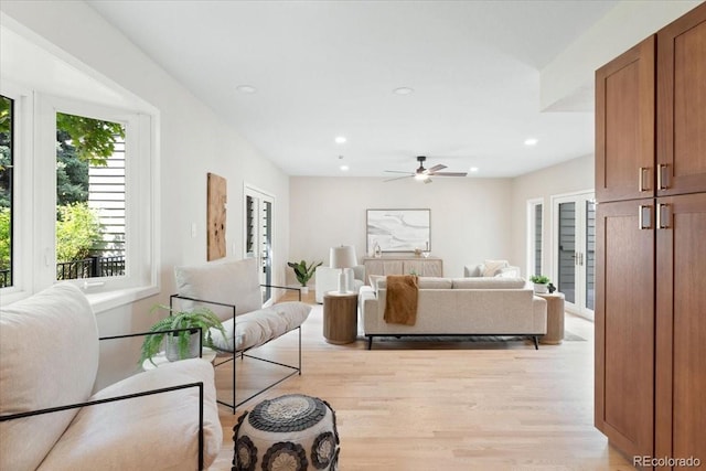 4505 S Yosemite St Unit 362, Denver, CO 80237 - living area featuring light wood finished floors, a ceiling fan, and recessed lighting