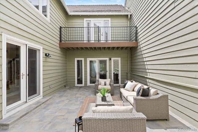 4505 S Yosemite St Unit 362, Denver, CO 80237 - view of patio / terrace with a balcony and an outdoor hangout area