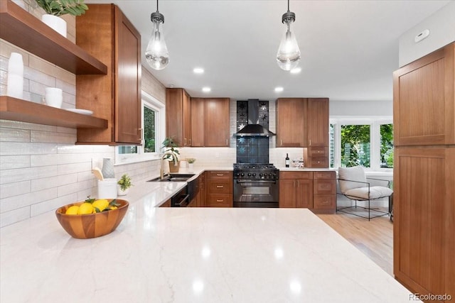 4505 S Yosemite St Unit 362, Denver, CO 80237 - kitchen with high end stove, wall chimney exhaust hood, open shelves, a sink, and brown cabinets