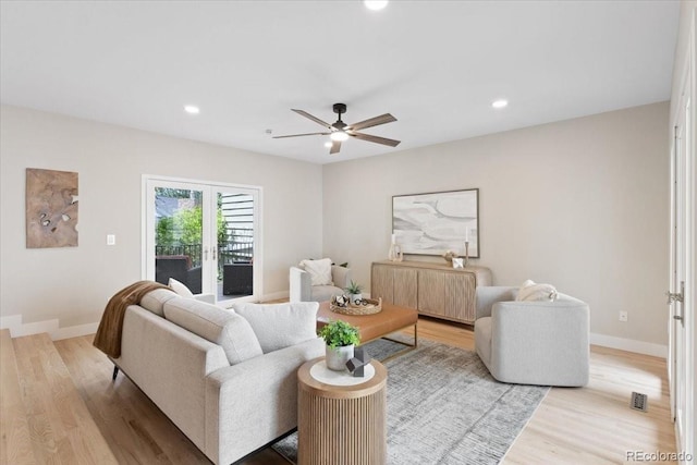 4505 S Yosemite St Unit 362, Denver, CO 80237 - living room featuring light wood-style flooring, ceiling fan, baseboards, and recessed lighting