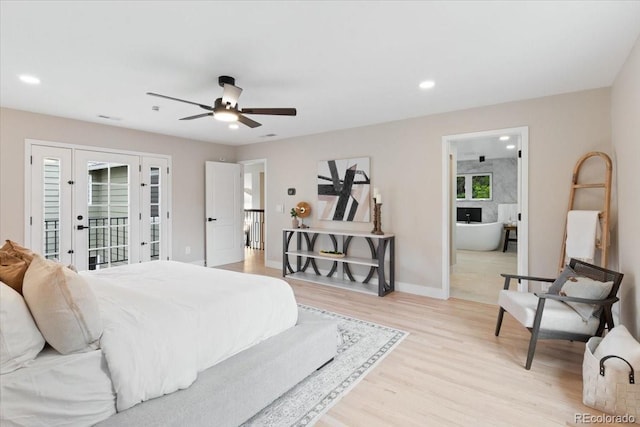 4505 S Yosemite St Unit 362, Denver, CO 80237 - bedroom with access to exterior, light wood-type flooring, recessed lighting, ensuite bathroom, and baseboards