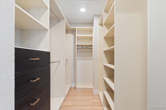 4505 S Yosemite St Unit 362, Denver, CO 80237 - spacious closet featuring light wood-style flooring