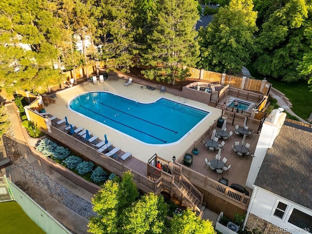 4505 S Yosemite St Unit 362, Denver, CO 80237 - community pool featuring a deck and outdoor dining area