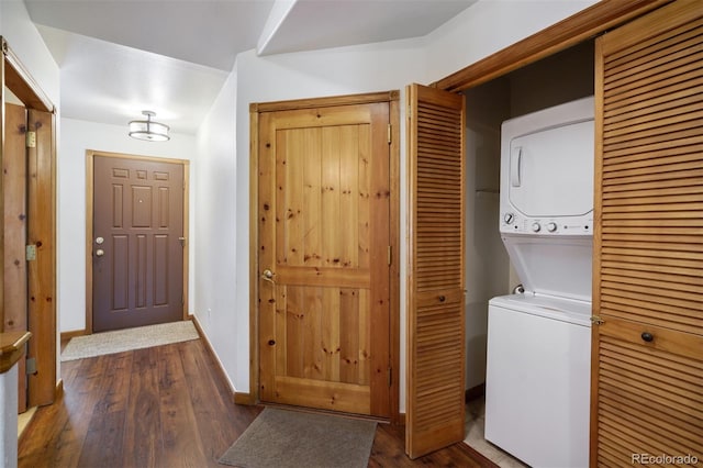 113 Lookout Ridge Dr, Dillon, CO 80435 - laundry room with stacked washer and clothes dryer and dark wood-style flooring