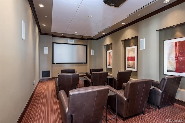 carpeted cinema room with ornamental molding