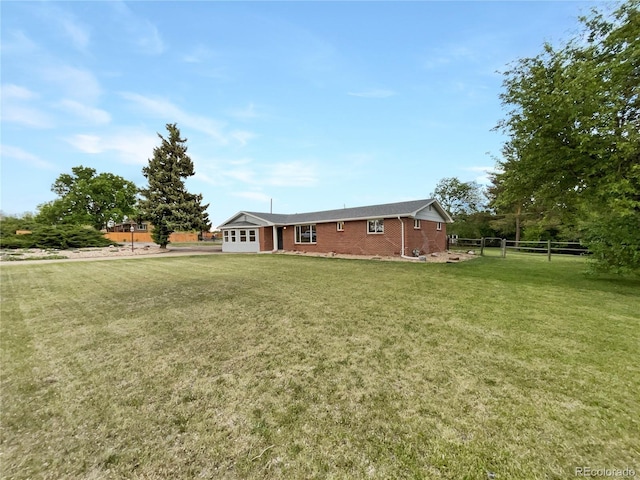 12682 Anhawa Ave, Longmont, CO 80503 - view of front of house with an attached garage and brick siding