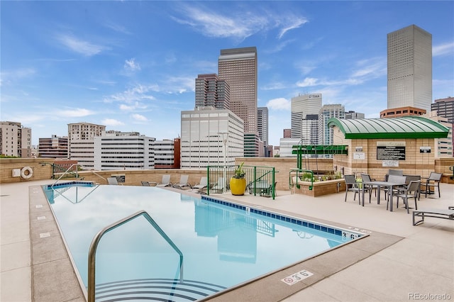 view of swimming pool featuring a patio