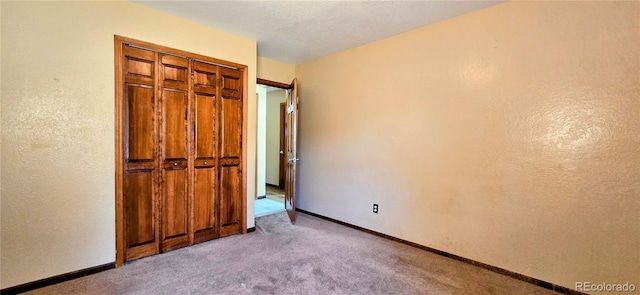 18170 Forest View Rd, Monument, CO 80132 - unfurnished bedroom featuring carpet, baseboards, and a closet