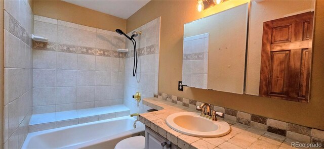 18170 Forest View Rd, Monument, CO 80132 - bathroom featuring vanity, shower / washtub combination, and toilet