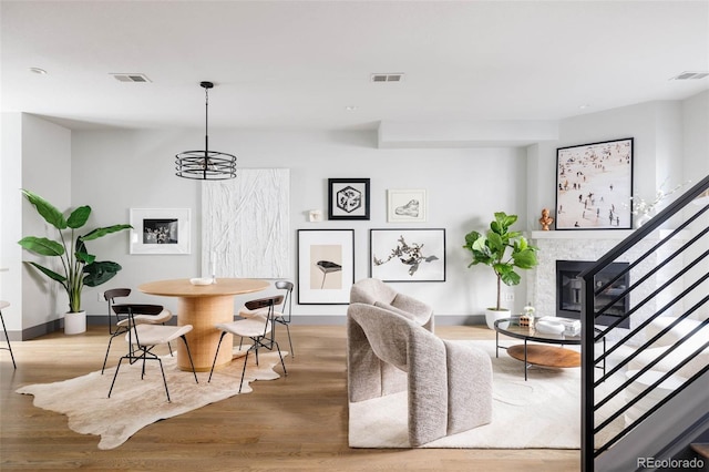 dining room with light hardwood / wood-style flooring