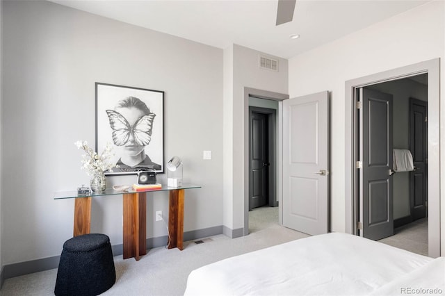 carpeted bedroom with ceiling fan