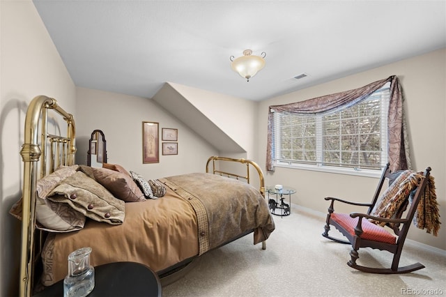 carpeted bedroom with baseboards and visible vents