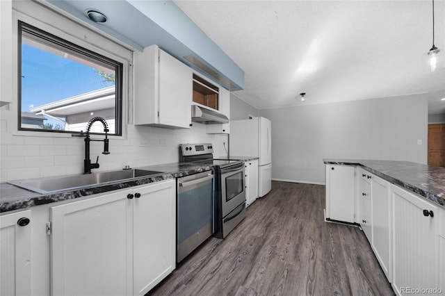 kitchen featuring pendant lighting, sink, decorative backsplash, appliances with stainless steel finishes, and white cabinetry