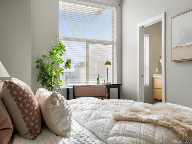 bedroom with multiple windows