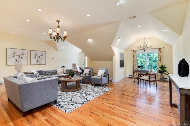 living area featuring visible vents, lofted ceiling, light wood-style floors, a chandelier, and recessed lighting