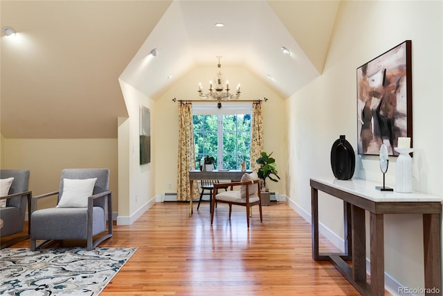 living area featuring baseboards, lofted ceiling, light wood-style floors, a baseboard heating unit, and a notable chandelier