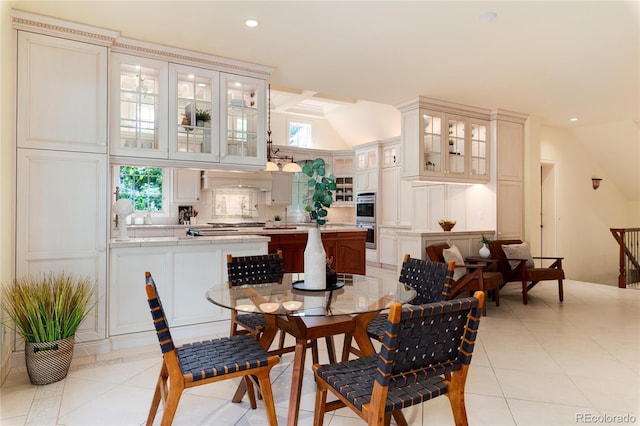 dining area featuring recessed lighting, plenty of natural light, and light tile patterned floors