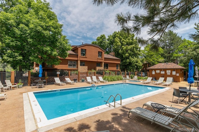 2685 S Dayton Way Unit 253, Denver, CO 80231 - community pool featuring a patio
