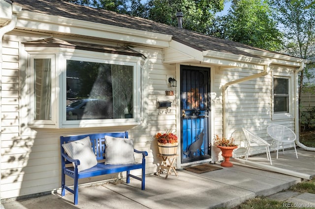 60 Vrain St, Denver, CO 80219 - property entrance featuring roof with shingles