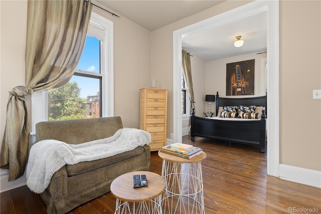 256 Bannock St, Denver, CO 80223 - sitting room with wood finished floors and baseboards