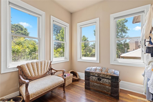 256 Bannock St, Denver, CO 80223 - sitting room with plenty of natural light and wood finished floors