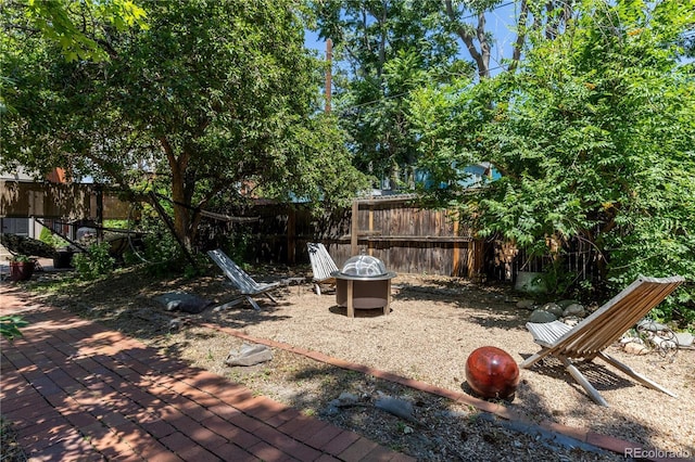 256 Bannock St, Denver, CO 80223 - view of yard with an outdoor fire pit