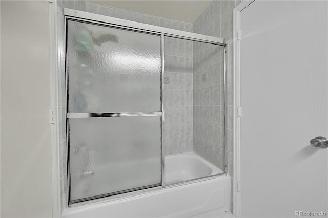 bathroom featuring enclosed tub / shower combo